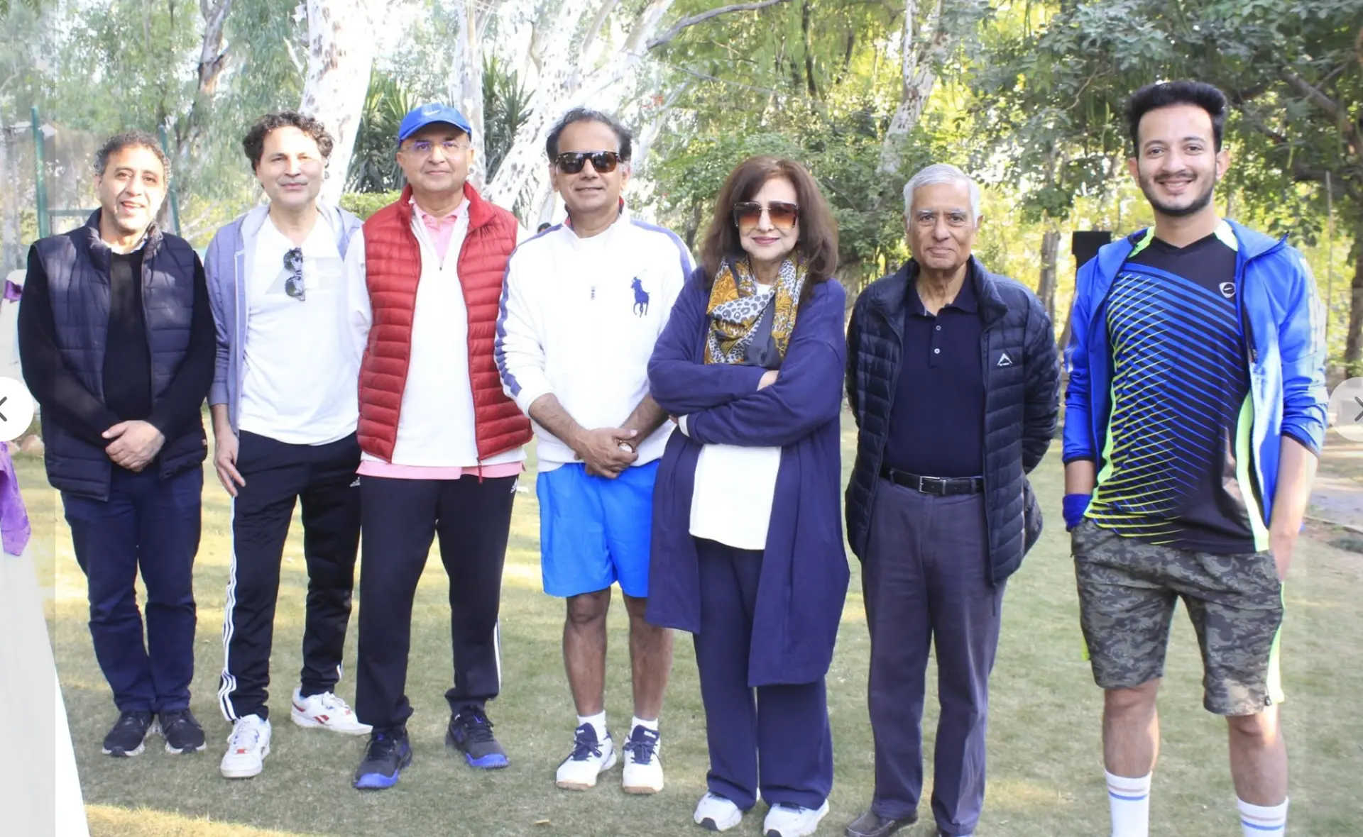 Nighat Saeed with members and guests at a Margalla Tennis Club gathering